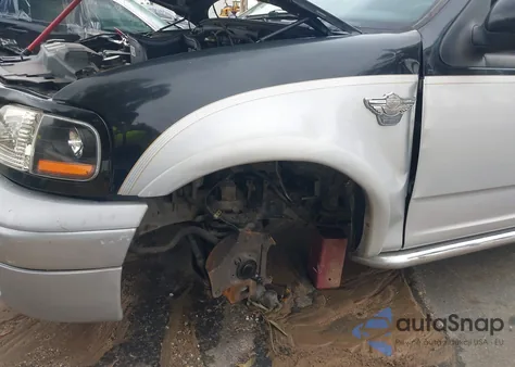 2003 Ford F-150 Lariat z USA, uszkodzony, nr VIN 1FTRW07323KD04865